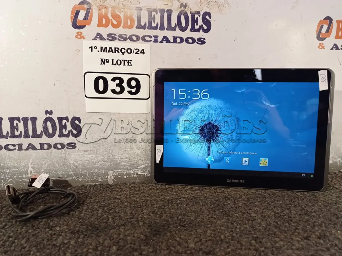 LOTE 039 - 01 TABLET SAMSUNG TAB2 TELA 10.1” COM CABO. (NO ESTADO) ATENÇÃO! FAZER A VISITAÇÃO ANTES DE ARREMATAR, NÃO SABEMOS SE FUNCIONA. LEILÃO NÃO TEM GARANTIA E NEM DEVOLUÇÃO, SUJEITO A POSSÍVEIS AVARIAS VISÍVEIS/OCULTAS E/OU AUSÊNCIA DE COMPONENTES.