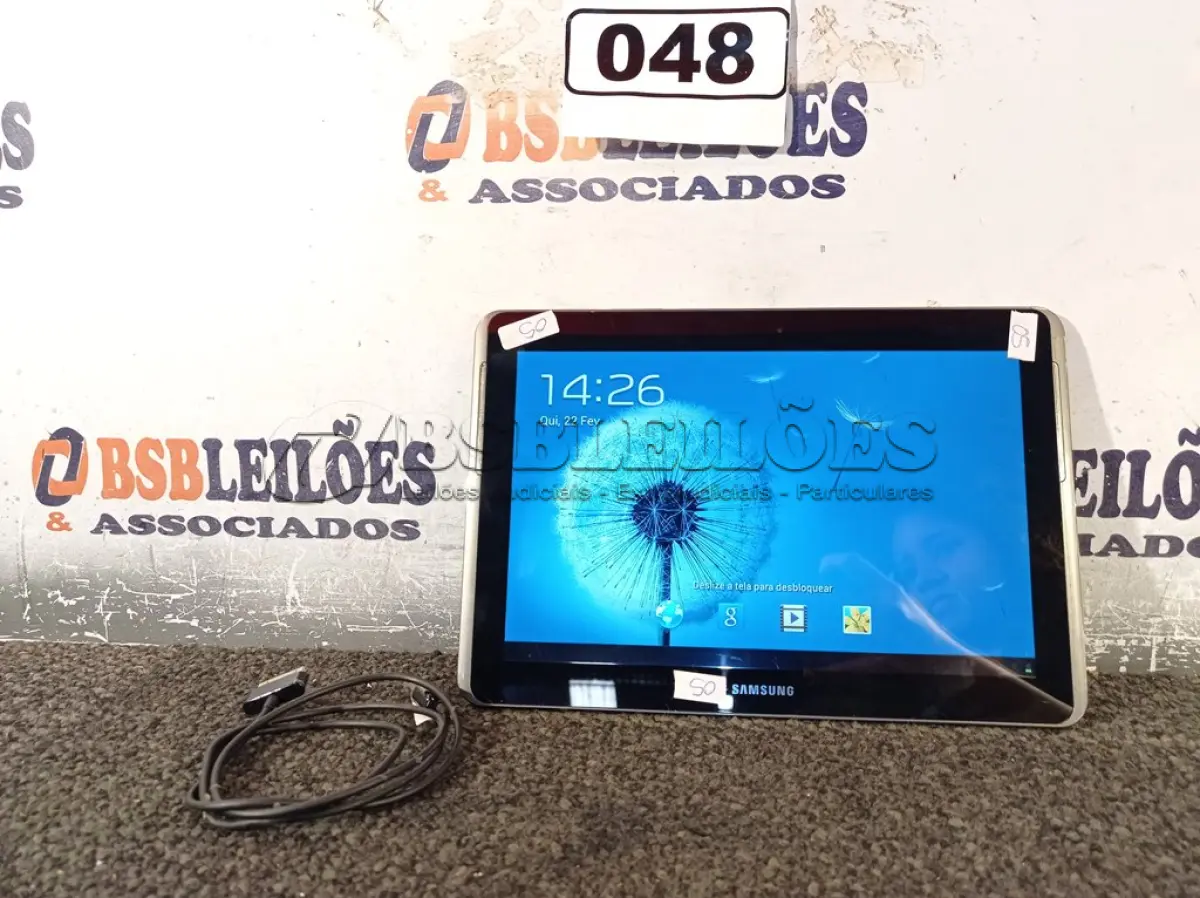 LOTE 048 - 01 TABLET SAMSUNG TAB2 TELA 10.1” COM CABO. (NO ESTADO) ATENÇÃO! FAZER A VISITAÇÃO ANTES DE ARREMATAR, NÃO SABEMOS SE FUNCIONA. LEILÃO NÃO TEM GARANTIA E NEM DEVOLUÇÃO, SUJEITO A POSSÍVEIS AVARIAS VISÍVEIS/OCULTAS E/OU AUSÊNCIA DE COMPONENTES.