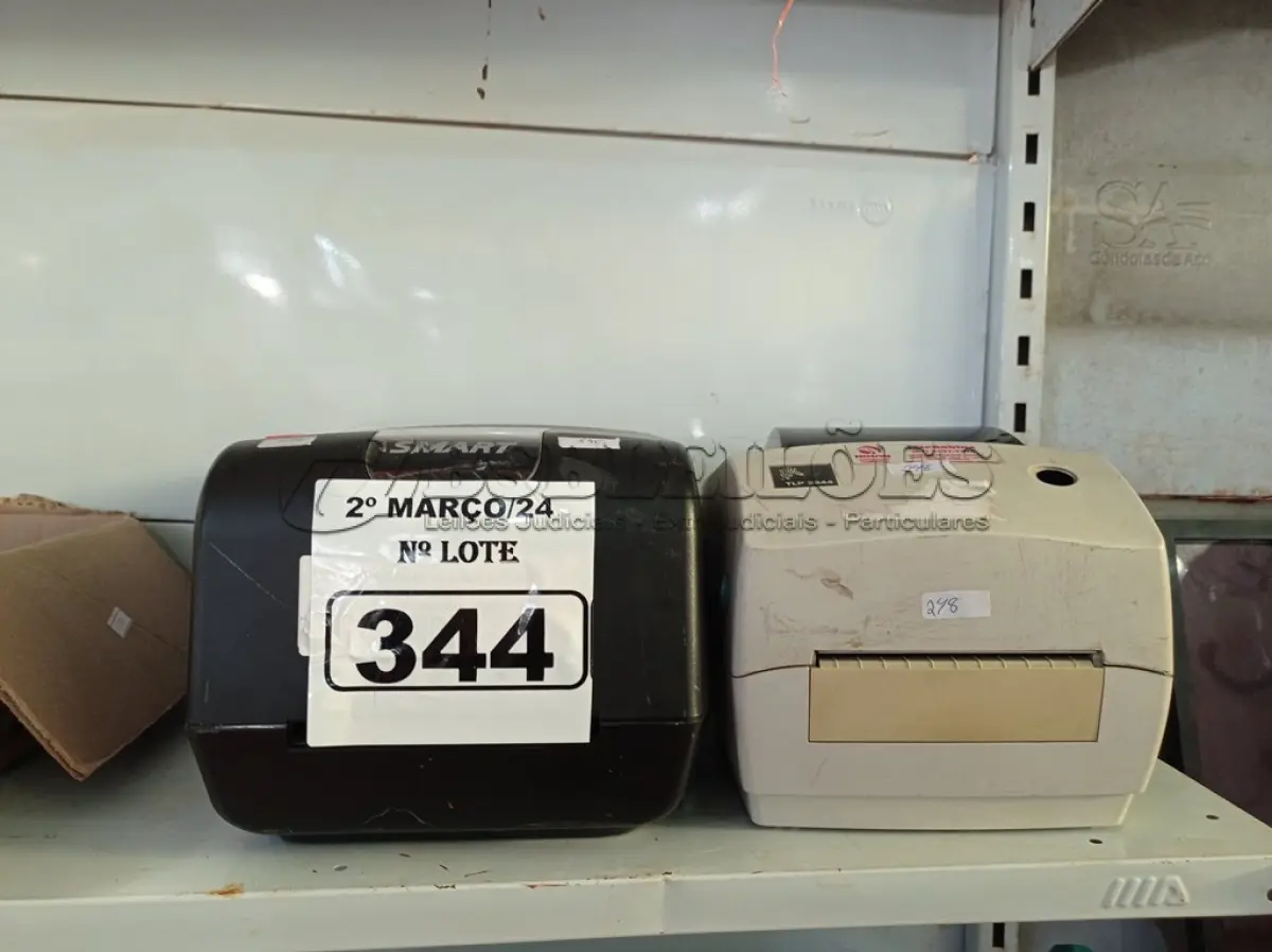 LOTE 344 - 02 IMPRESSORAS DE ETIQUETAS MARCAS E MODELOS DIVERSOS. (NO ESTADO) ATENÇÃO! FAZER A VISITAÇÃO ANTES DE ARREMATAR, NÃO SABEMOS SE FUNCIONA. LEILÃO NÃO TEM GARANTIA E NEM DEVOLUÇÃO, SUJEITO A POSSÍVEIS AVARIAS VISÍVEIS/OCULTAS E/OU AUSÊNCIA DE COMPONENTES.