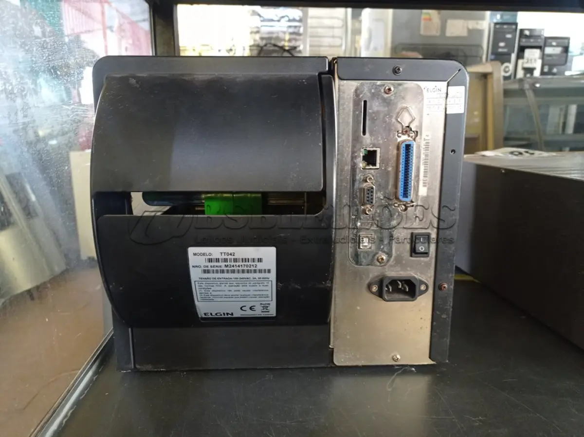 LOTE 379 - 01 IMPRESSORA DE ETIQUETAS MARCA ELGIN. (NO ESTADO) ATENÇÃO! FAZER A VISITAÇÃO ANTES DE ARREMATAR, NÃO SABEMOS SE FUNCIONA. LEILÃO NÃO TEM GARANTIA E NEM DEVOLUÇÃO, SUJEITO A POSSÍVEIS AVARIAS VISÍVEIS/OCULTAS E/OU AUSÊNCIA DE COMPONENTES.