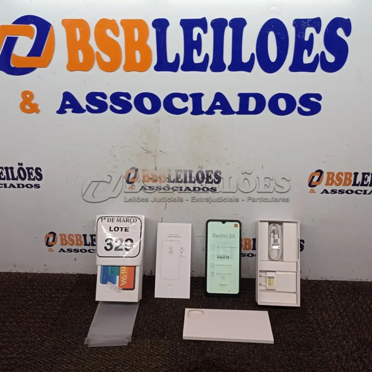 LOTE 329 - 01 CELULAR READMI A9 (NOVO). (NO ESTADO) ATENÇÃO! FAZER A VISITAÇÃO ANTES DE ARREMATAR, NÃO SABEMOS SE FUNCIONA. LEILÃO NÃO TEM GARANTIA E NEM DEVOLUÇÃO, SUJEITO A POSSÍVEIS AVARIAS VISÍVEIS/OCULTAS E/OU AUSÊNCIA DE COMPONENTES.