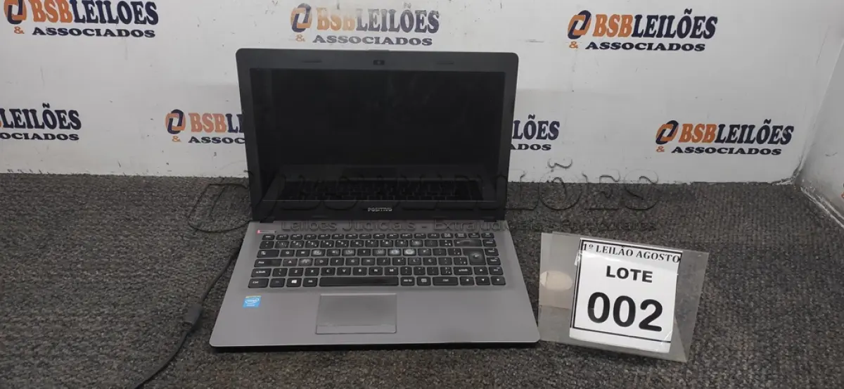 LOTE 002 - 01 NOTEBOOK MARCA POSITIVO. (NO ESTADO) ATENÇÃO! FAZER A VISITAÇÃO ANTES DE ARREMATAR, NÃO SABEMOS SE FUNCIONA. LEILÃO NÃO TEM GARANTIA E NEM DEVOLUÇÃO, SUJEITO A POSSÍVEIS AVARIAS VISÍVEIS/OCULTAS E/OU AUSÊNCIA DE COMPONENTES.
