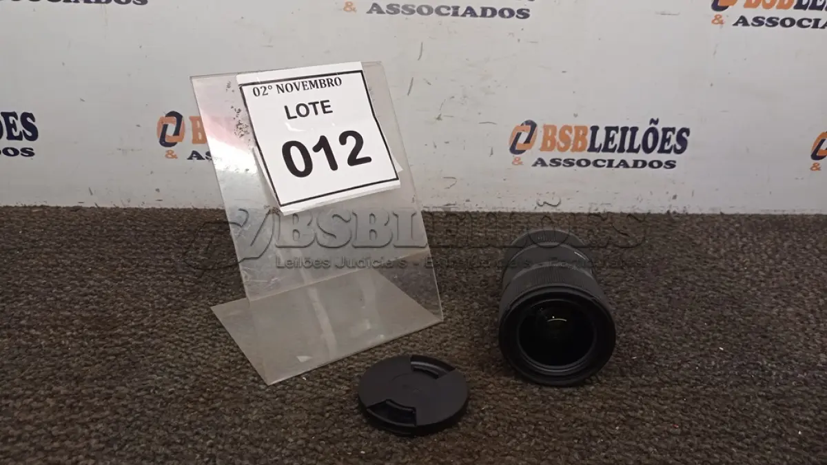 LOTE 012 - 01 LENTE DE CÂMERA 18-35MM MARCA SIGMA. (NO ESTADO) ATENÇÃO! FAZER A VISITAÇÃO ANTES DE ARREMATAR, NÃO SABEMOS SE FUNCIONA, LEILÃO NÃO TEM GARANTIA E NEM DEVOLUÇÃO, SUJEITO A POSSÍVEIS AVARIAS VISÍVEIS/OCULTAS E/OU AUSÊNCIA DE COMPONENTES.