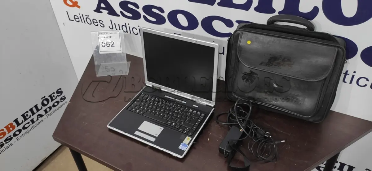 LOTE 062 - 01 NOTEBOOK COM FONTE E MALETA MARCA ITAUTEC.  (NO ESTADO) ATENÇÃO! FAZER A VISITAÇÃO ANTES DE ARREMATAR, NÃO SABEMOS SE FUNCIONA. LEILÃO NÃO TEM GARANTIA E NEM DEVOLUÇÃO, SUJEITO A POSSÍVEIS AVARIAS VISÍVEIS/OCULTAS E/OU AUSÊNCIA DE COMPONENTES.