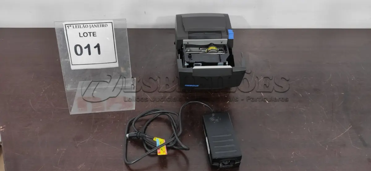 LOTE 011 - 01 IMPRESSORA DE CUPOM COM FONTE MARCA DIEBOLD.  (NO ESTADO) ATENÇÃO! FAZER A VISITAÇÃO ANTES DE ARREMATAR, NÃO SABEMOS SE FUNCIONA. LEILÃO NÃO TEM GARANTIA E NEM DEVOLUÇÃO, SUJEITO A POSSÍVEIS AVARIAS VISÍVEIS/OCULTAS E/OU AUSÊNCIA DE COMPONENTES.