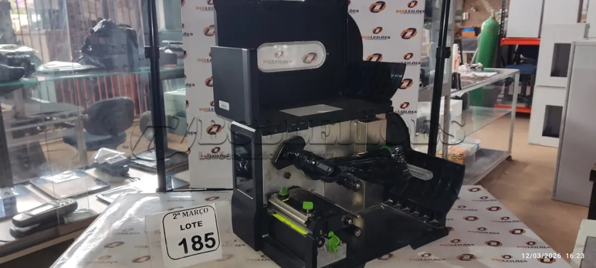 LOTE 185 - 01 IMPRESSORA DE ETIQUETAS MARCA ELGIN. (NO ESTADO) ATENÇÃO! FAZER A VISITAÇÃO ANTES DE ARREMATAR, NÃO SABEMOS SE FUNCIONA, LEILÃO NÃO TEM GARANTIA E NEM DEVOLUÇÃO, SUJEITO A POSSÍVEIS AVARIAS VISÍVEIS/OCULTAS E/OU AUSÊNCIA DE COMPONENTES.