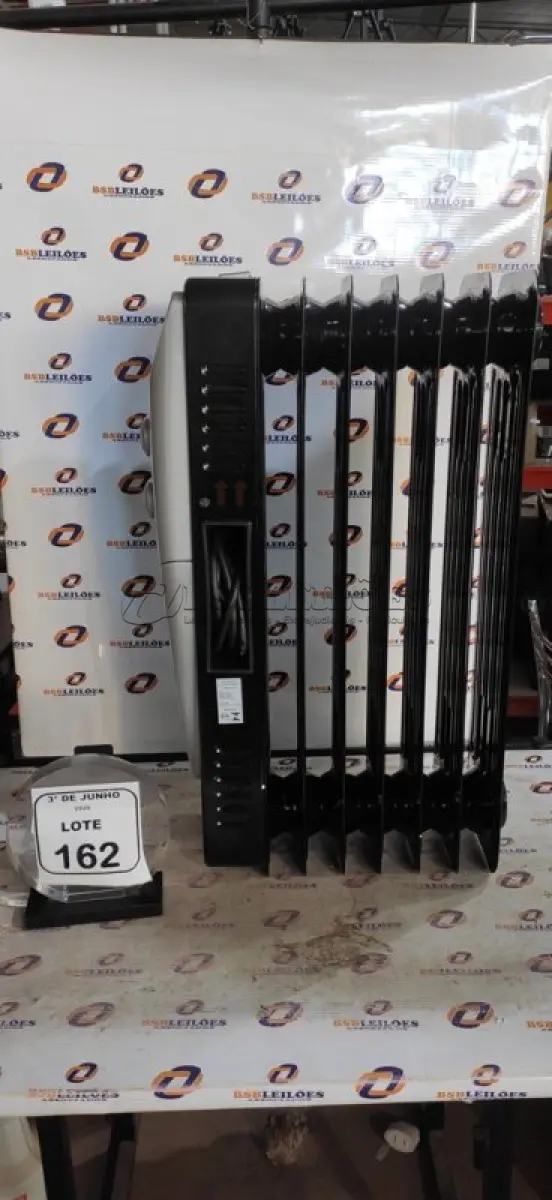 LOTE 162 - 01 AQUECEDOR 1500W 220V MARCA MONDIAL. (NO ESTADO) ATENÇÃO! FAZER A VISITAÇÃO ANTES DE ARREMATAR, NÃO SABEMOS SE FUNCIONA, LEILÃO NÃO TEM GARANTIA E NEM DEVOLUÇÃO, SUJEITO A POSSÍVEIS AVARIAS VISÍVEIS/OCULTAS E/OU AUSÊNCIA DE COMPONENTES.