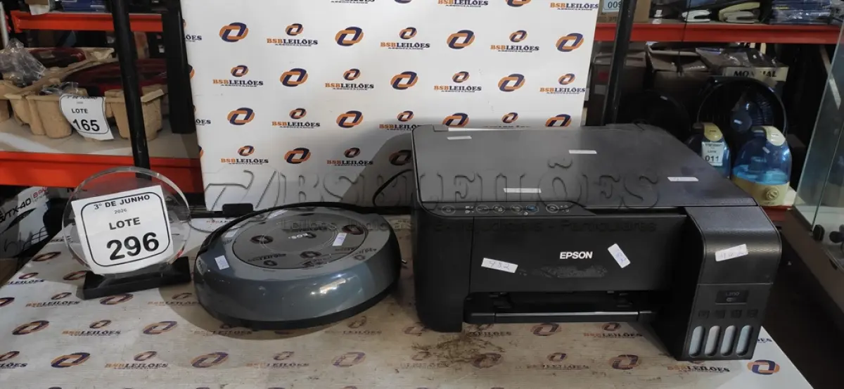 LOTE 296 - 01 IMPRESSORA MODELO L3150 MARCA EPSON E 01 ASPIRADOR ROBÔ MARCA EOS. (NO ESTADO) ATENÇÃO! FAZER A VISITAÇÃO ANTES DE ARREMATAR, NÃO SABEMOS SE FUNCIONA, LEILÃO NÃO TEM GARANTIA E NEM DEVOLUÇÃO, SUJEITO A POSSÍVEIS AVARIAS VISÍVEIS/OCULTAS E/OU AUSÊNCIA DE COMPONENTES.