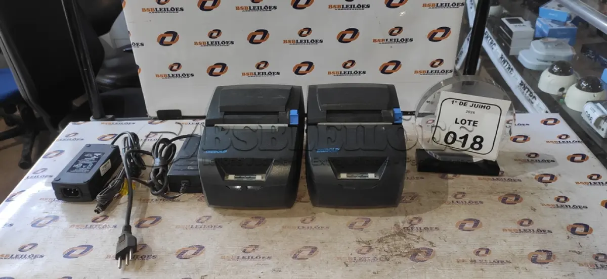 LOTE 018 - 02 IMPRESSORAS DE CUPOM MARCA DIEBOLD COM FONTE. (NO ESTADO) ATENÇÃO! FAZER A VISITAÇÃO ANTES DE ARREMATAR, NÃO SABEMOS SE FUNCIONA, LEILÃO NÃO TEM GARANTIA E NEM DEVOLUÇÃO, SUJEITO A POSSÍVEIS AVARIAS VISÍVEIS/OCULTAS E/OU AUSÊNCIA DE COMPONENTES.