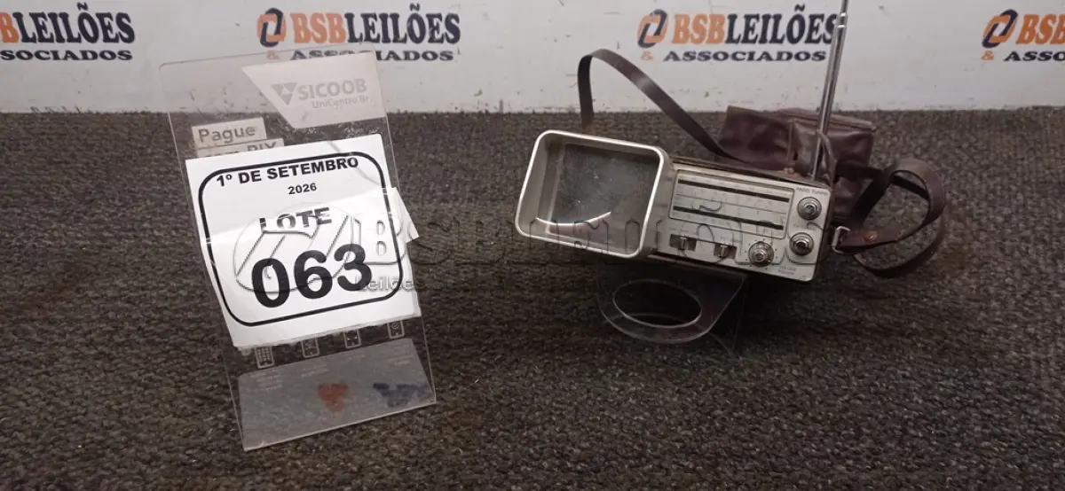 01 MINI TV/RÁDIO PORTÁTIL MARCA BROKSONIC