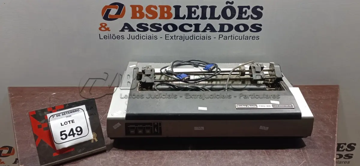 LOTE 549 - 01 IMPRESSORA MATRICIAL MODELO TRS-80 MARCA RADIO SHAEK. (NO ESTADO) ATENÇÃO! FAZER A VISITAÇÃO ANTES DE ARREMATAR, NÃO SABEMOS SE FUNCIONA, LEILÃO NÃO TEM GARANTIA E NEM DEVOLUÇÃO, SUJEITO A POSSÍVEIS AVARIAS VISÍVEIS/OCULTAS E/OU AUSÊNCIA DE COMPONENTES.