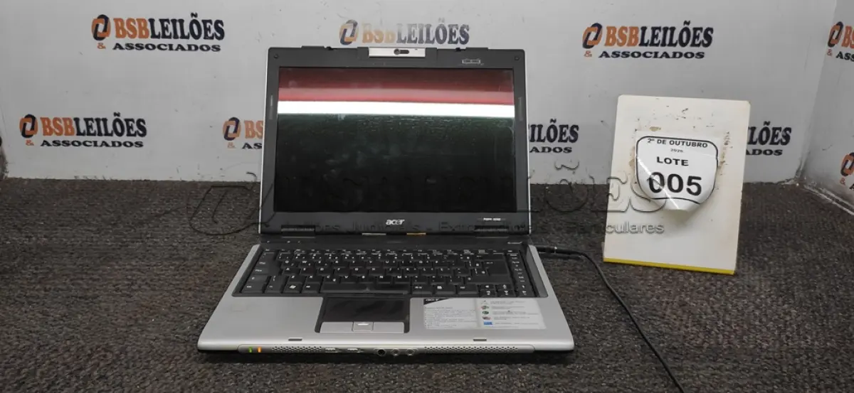 LOTE 005 - 01 NOTEBOOK MARCA ACER SEM CARREGADOR. (NO ESTADO) ATENÇÃO! FAZER A VISITAÇÃO ANTES DE ARREMATAR, NÃO SABEMOS SE FUNCIONA, LEILÃO NÃO TEM GARANTIA E NEM DEVOLUÇÃO, SUJEITO A POSSÍVEIS AVARIAS VISÍVEIS/OCULTAS E/OU AUSÊNCIA DE COMPONENTES.