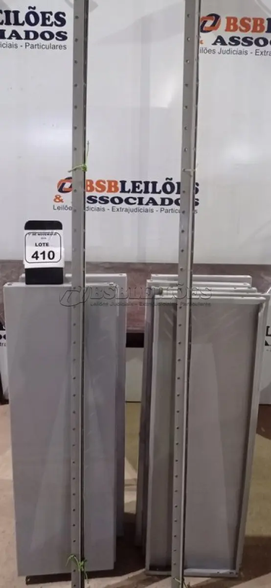 LOTE 410 - 02 ESTANTES DE FERRO DESMONTADAS DE APROXIMADAMENTE 1,95X0,95M COM 06 PRATELEIRAS CADA. (NO ESTADO) ATENÇÃO! FAZER A VISITAÇÃO ANTES DE ARREMATAR, NÃO SABEMOS SE FUNCIONA, LEILÃO NÃO TEM GARANTIA E NEM DEVOLUÇÃO, SUJEITO A POSSÍVEIS AVARIAS VISÍVEIS/OCULTAS E/OU AUSÊNCIA DE COMPONENTES.