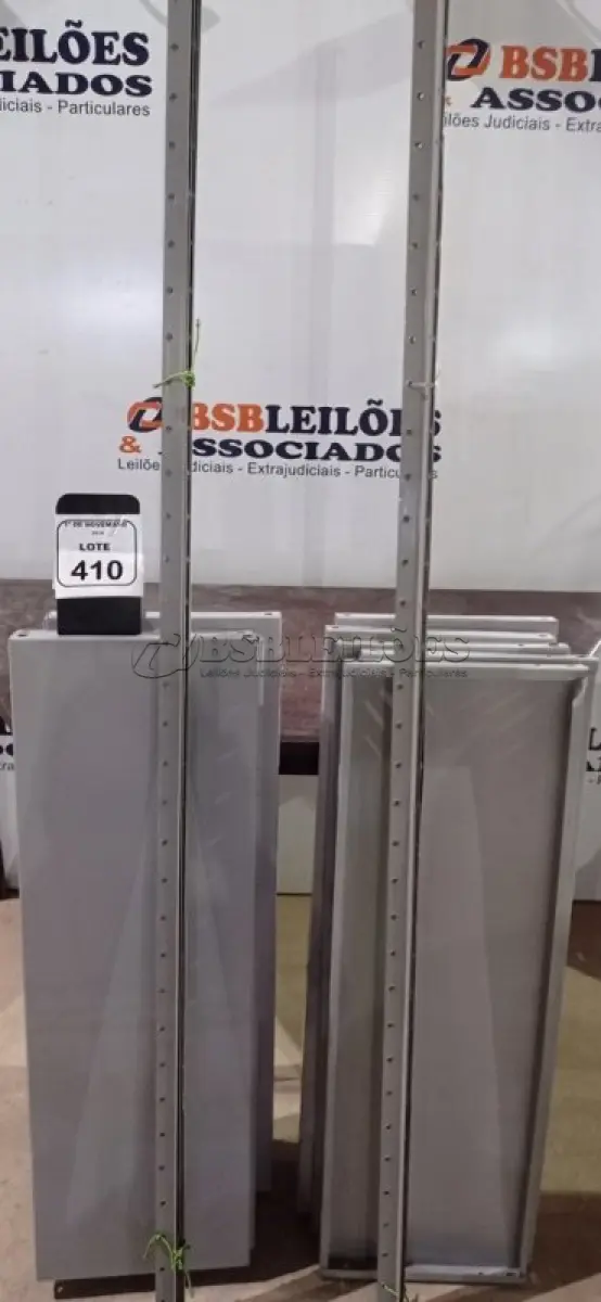LOTE 410 - 02 ESTANTES DE FERRO DESMONTADAS DE APROXIMADAMENTE 1,95X0,95M COM 06 PRATELEIRAS CADA. (NO ESTADO) ATENÇÃO! FAZER A VISITAÇÃO ANTES DE ARREMATAR, NÃO SABEMOS SE FUNCIONA, LEILÃO NÃO TEM GARANTIA E NEM DEVOLUÇÃO, SUJEITO A POSSÍVEIS AVARIAS VISÍVEIS/OCULTAS E/OU AUSÊNCIA DE COMPONENTES.