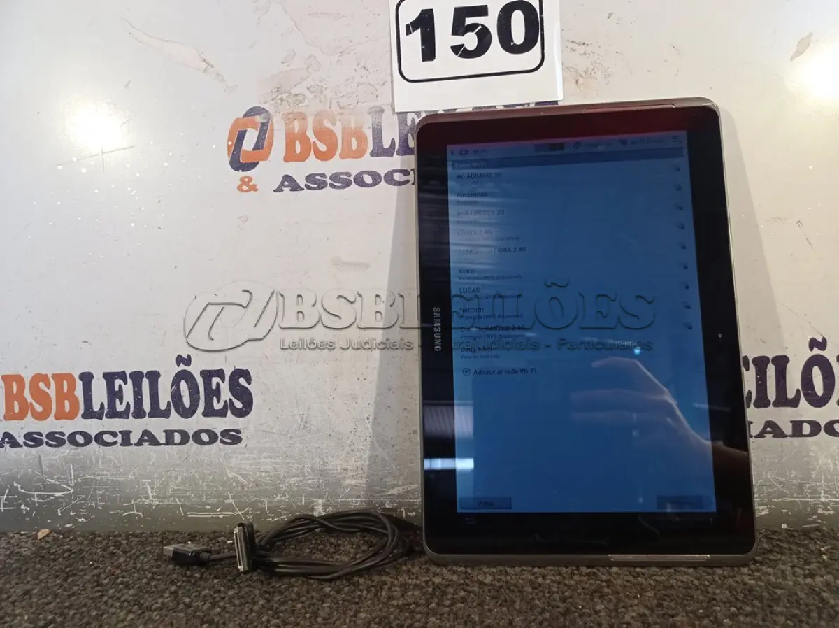 LOTE 150 - 01 TABLET SAMSUNG COM CABO. (NO ESTADO) ATENÇÃO! FAZER A VISITAÇÃO ANTES DE ARREMATAR, NÃO SABEMOS SE FUNCIONA. LEILÃO NÃO TEM GARANTIA E NEM DEVOLUÇÃO, SUJEITO A POSSÍVEIS AVARIAS VISÍVEIS/OCULTAS E/OU AUSÊNCIA DE COMPONENTES.
