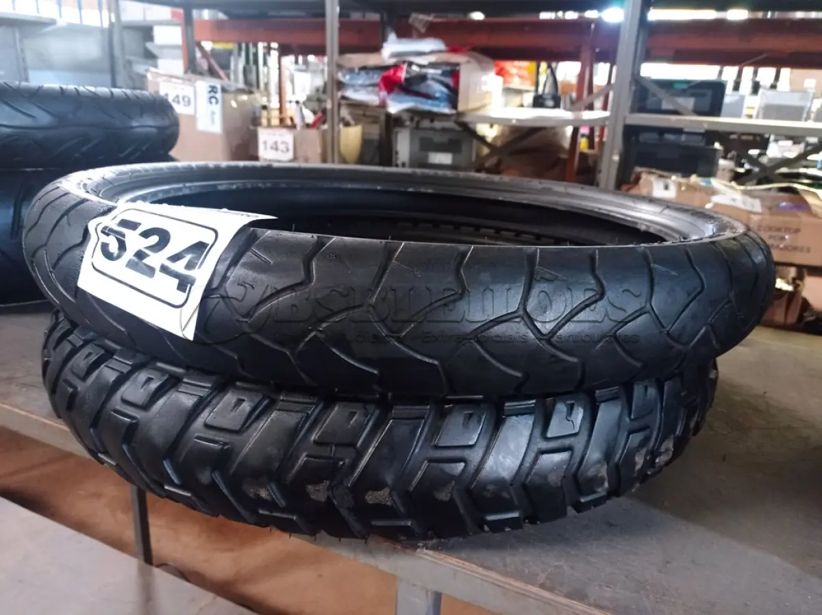 LOTE 524 - 02 PNEUS DE MOTO 90/90/21, 120/70/19. (NO ESTADO) ATENÇÃO! FAZER A VISITAÇÃO ANTES DE ARREMATAR, NÃO SABEMOS SE FUNCIONA. LEILÃO NÃO TEM GARANTIA E NEM DEVOLUÇÃO, SUJEITO A POSSÍVEIS AVARIAS VISÍVEIS/OCULTAS E/OU AUSÊNCIA DE COMPONENTES.