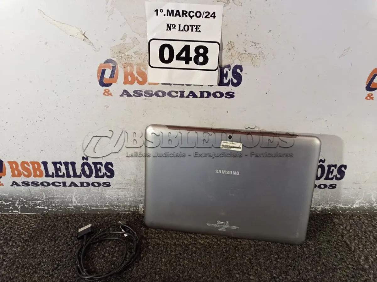 LOTE 048 - 01 TABLET SAMSUNG TAB2 TELA 10.1” COM CABO. (NO ESTADO) ATENÇÃO! FAZER A VISITAÇÃO ANTES DE ARREMATAR, NÃO SABEMOS SE FUNCIONA. LEILÃO NÃO TEM GARANTIA E NEM DEVOLUÇÃO, SUJEITO A POSSÍVEIS AVARIAS VISÍVEIS/OCULTAS E/OU AUSÊNCIA DE COMPONENTES.