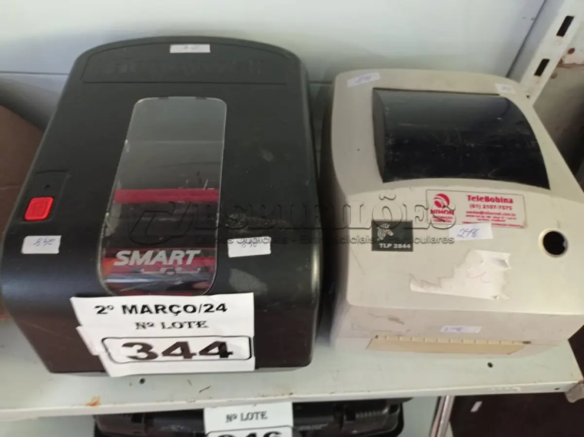LOTE 344 - 02 IMPRESSORAS DE ETIQUETAS MARCAS E MODELOS DIVERSOS. (NO ESTADO) ATENÇÃO! FAZER A VISITAÇÃO ANTES DE ARREMATAR, NÃO SABEMOS SE FUNCIONA. LEILÃO NÃO TEM GARANTIA E NEM DEVOLUÇÃO, SUJEITO A POSSÍVEIS AVARIAS VISÍVEIS/OCULTAS E/OU AUSÊNCIA DE COMPONENTES.