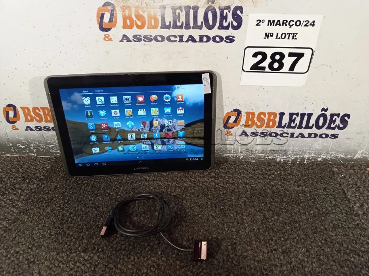 LOTE 287 - 01 TABLET SAMSUNG TAB2 TELA 10.1” COM CABO. (NO ESTADO) ATENÇÃO! FAZER A VISITAÇÃO ANTES DE ARREMATAR, NÃO SABEMOS SE FUNCIONA. LEILÃO NÃO TEM GARANTIA E NEM DEVOLUÇÃO, SUJEITO A POSSÍVEIS AVARIAS VISÍVEIS/OCULTAS E/OU AUSÊNCIA DE COMPONENTES.