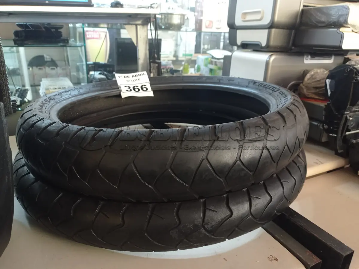 LOTE 366 - 02 PNEUS DE MOTO USADOS 120/70/19 E 90/90/21. (NO ESTADO) ATENÇÃO! FAZER A VISITAÇÃO ANTES DE ARREMATAR, NÃO SABEMOS SE FUNCIONA. LEILÃO NÃO TEM GARANTIA E NEM DEVOLUÇÃO, SUJEITO A POSSÍVEIS AVARIAS VISÍVEIS/OCULTAS E/OU AUSÊNCIA DE COMPONENTES.