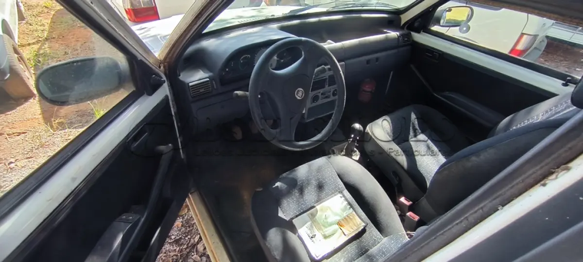 LOTE 040 - 01 FIAT UNO MILLE WAY ECON; PLACA: JIC-6188; ANO: 2009. CHASSI: 9BD15844AA6345945, RENAVAM: 00165582910; (TAMPA TRASEIRA AMASSADA, VEÍCULO NÃO FUNCIONA BOMBA DE COMBUSTÍVEL TRAVADA). (NO ESTADO)