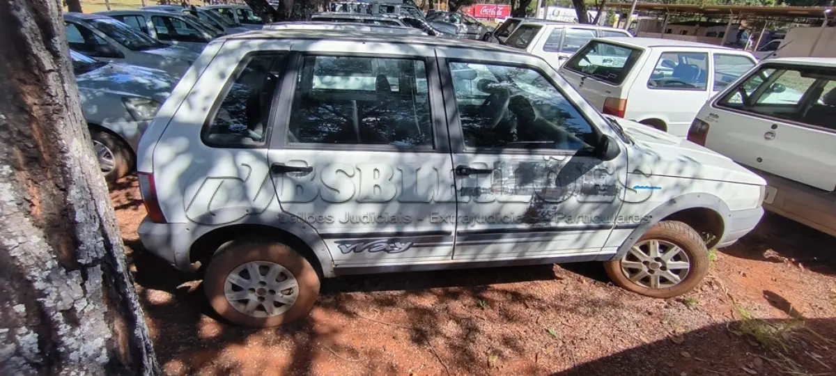 LOTE 040 - 01 FIAT UNO MILLE WAY ECON; PLACA: JIC-6188; ANO: 2009. CHASSI: 9BD15844AA6345945, RENAVAM: 00165582910; (TAMPA TRASEIRA AMASSADA, VEÍCULO NÃO FUNCIONA BOMBA DE COMBUSTÍVEL TRAVADA). (NO ESTADO)