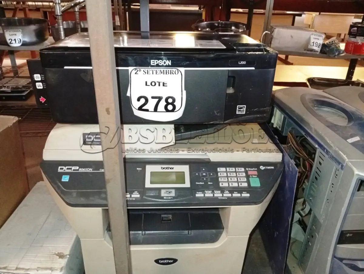 LOTE 278 - 02 IMPRESSORAS SENDO UMA MULTIFUNCIONAL MARCA BROTHER MODELO 8065DN E UMA EPSON. (NO ESTADO) ATENÇÃO! FAZER A VISITAÇÃO ANTES DE ARREMATAR, NÃO SABEMOS SE FUNCIONA. LEILÃO NÃO TEM GARANTIA E NEM DEVOLUÇÃO, SUJEITO A POSSÍVEIS AVARIAS VISÍVEIS/OCULTAS E/OU AUSÊNCIA DE COMPONENTES.