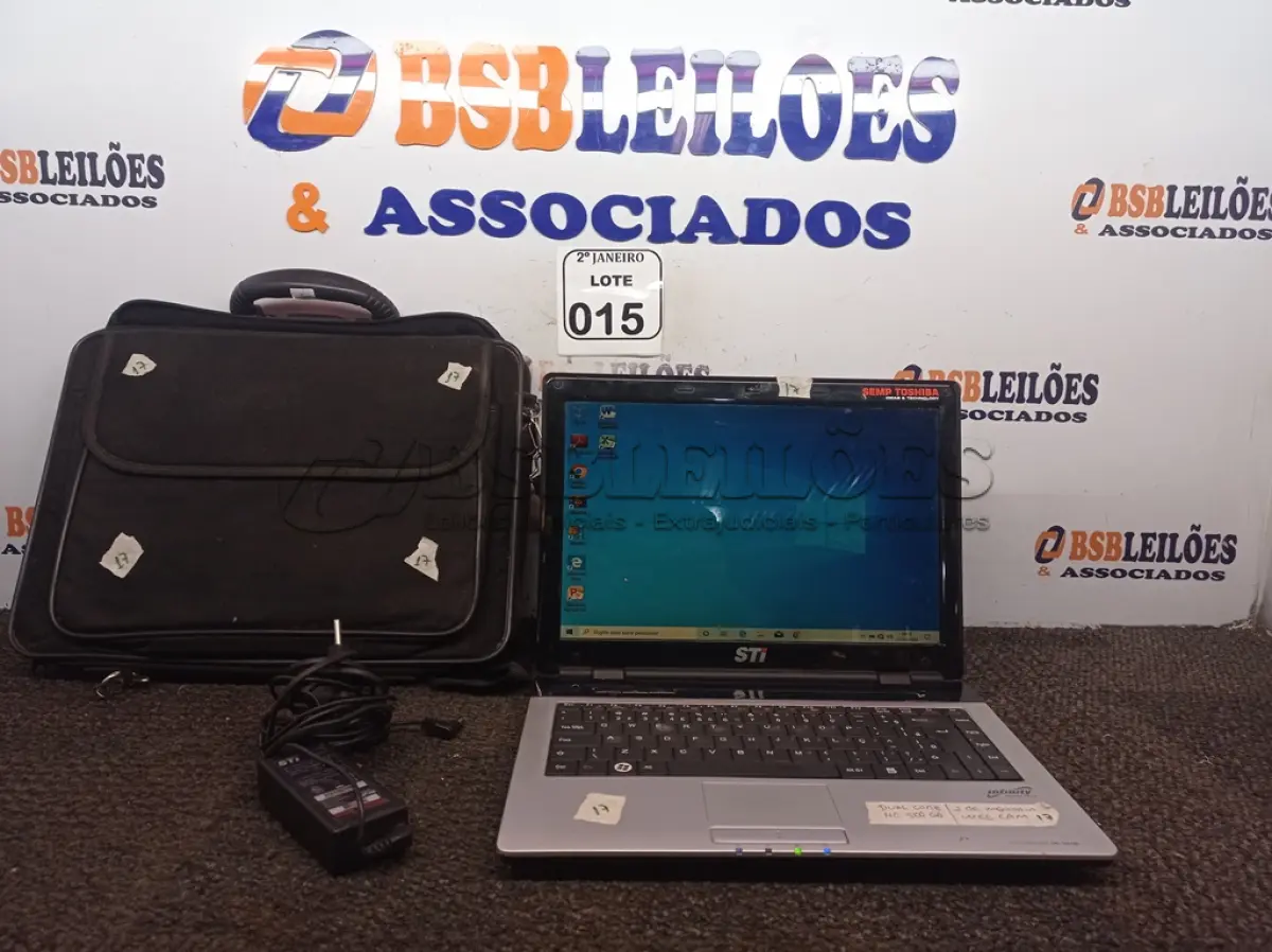 LOTE 015 - 01 NOTEBOOK MARCA STI DUAL CORE HD 250GB, 2GB DE MEMÓRIA E WEBCAM C/MALETA E FONTE. (NO ESTADO) ATENÇÃO! FAZER A VISITAÇÃO ANTES DE ARREMATAR, NÃO SABEMOS SE FUNCIONA. LEILÃO NÃO TEM GARANTIA E NEM DEVOLUÇÃO, SUJEITO A POSSÍVEIS AVARIAS VISÍVEIS/OCULTAS E/OU AUSÊNCIA DE COMPONENTES.