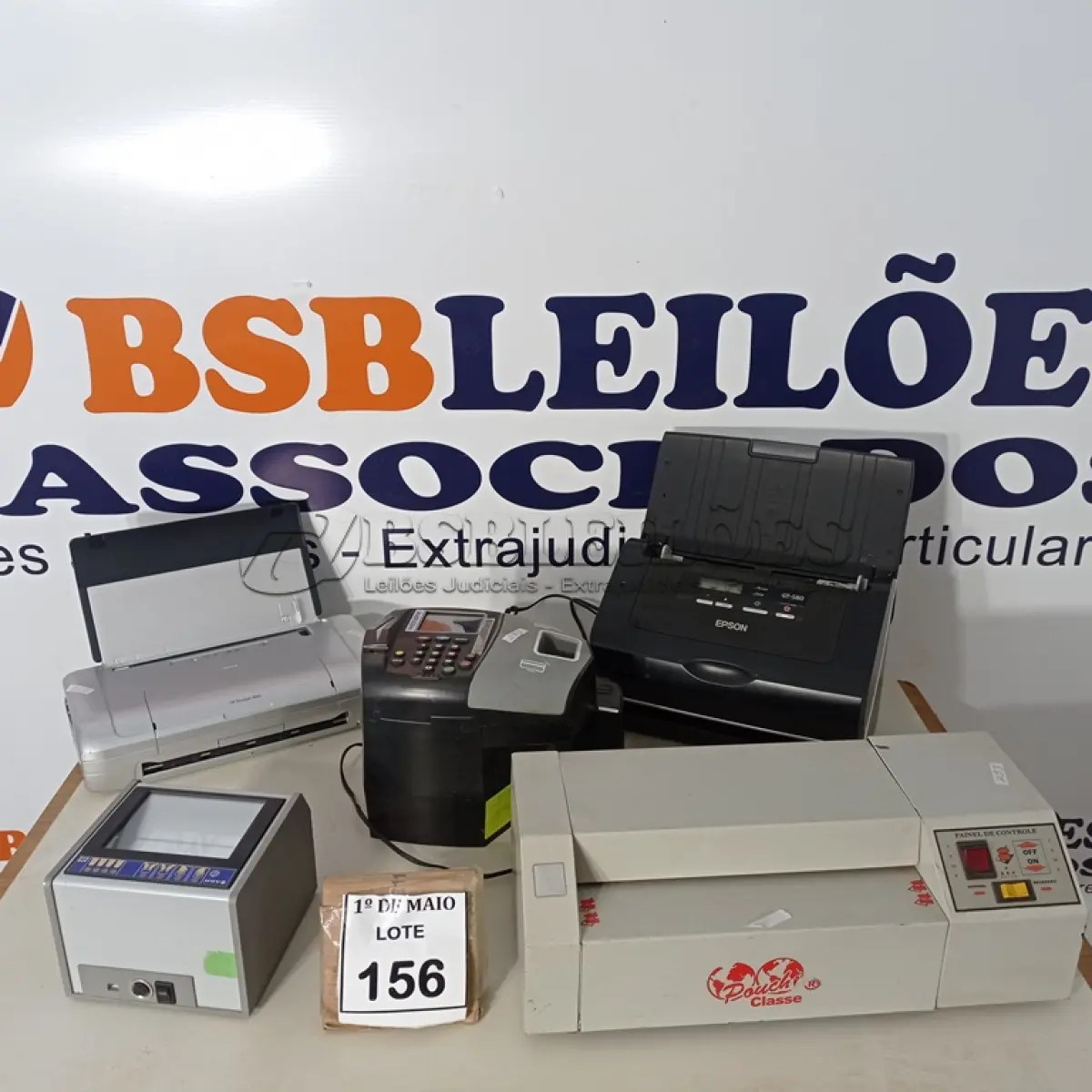 LOTE 156 - 02 SCANNERS MARCA EPSON E HP, 01 LEITORA DE CÓDIGO DE BARRAS, 01 RELÓGIO DE PONTO E 01 PLASTIFICADORA. (NO ESTADO) ATENÇÃO! FAZER A VISITAÇÃO ANTES DE ARREMATAR, NÃO SABEMOS SE FUNCIONA. LEILÃO NÃO TEM GARANTIA E NEM DEVOLUÇÃO, SUJEITO A POSSÍVEIS AVARIAS VISÍVEIS/OCULTAS E/OU AUSÊNCIA DE COMPONENTES.