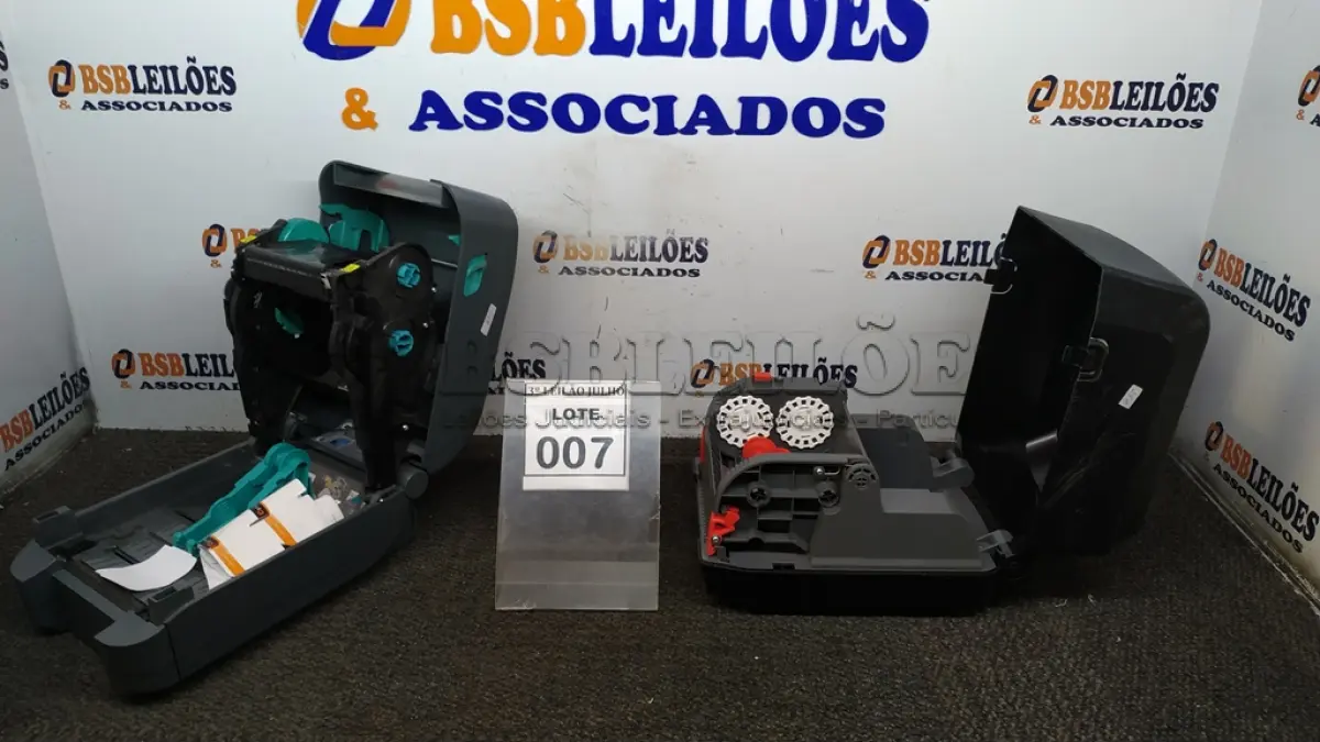 LOTE 007 - 01 IMPRESSORA TÉRMICA DE ETIQUETAS MARCA ZEBRA E 01 IMPRESSORA TÉRMICA MARCA HONEWEEL. (NO ESTADO) ATENÇÃO! FAZER A VISITAÇÃO ANTES DE ARREMATAR, NÃO SABEMOS SE FUNCIONA, LEILÃO NÃO TEM GARANTIA E NEM DEVOLUÇÃO, SUJEITO A POSSÍVEIS AVARIAS VISÍVEIS/OCULTAS E/OU AUSÊNCIA DE COMPONENTES.