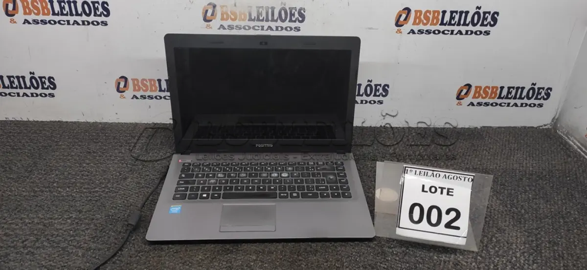 LOTE 002 - 01 NOTEBOOK MARCA POSITIVO. (NO ESTADO) ATENÇÃO! FAZER A VISITAÇÃO ANTES DE ARREMATAR, NÃO SABEMOS SE FUNCIONA. LEILÃO NÃO TEM GARANTIA E NEM DEVOLUÇÃO, SUJEITO A POSSÍVEIS AVARIAS VISÍVEIS/OCULTAS E/OU AUSÊNCIA DE COMPONENTES.