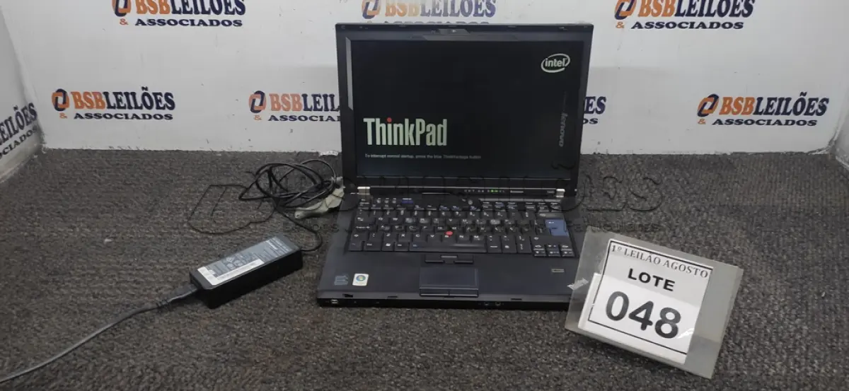 LOTE 048 - 01 NOTEBOOK COM FONTE MARCA LENOVO. (NO ESTADO) ATENÇÃO! FAZER A VISITAÇÃO ANTES DE ARREMATAR, NÃO SABEMOS SE FUNCIONA. LEILÃO NÃO TEM GARANTIA E NEM DEVOLUÇÃO, SUJEITO A POSSÍVEIS AVARIAS VISÍVEIS/OCULTAS E/OU AUSÊNCIA DE COMPONENTES.