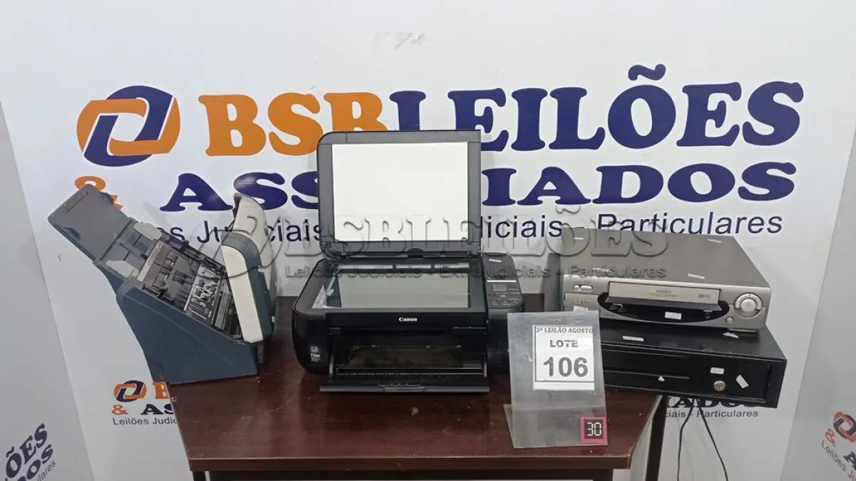 LOTE 106 - 01 GAVETA DE DINHEIRO, 01 IMPRESSORA MARCA CANON, 01 APARELHO DE VÍDEO CASSETE E 01 SCANNER MARCA AVISION. (NO ESTADO) ATENÇÃO! FAZER A VISITAÇÃO ANTES DE ARREMATAR, NÃO SABEMOS SE FUNCIONA, LEILÃO NÃO TEM GARANTIA E NEM DEVOLUÇÃO, SUJEITO A POSSÍVEIS AVARIAS VISÍVEIS/OCULTAS E/OU AUSÊNCIA DE COMPONENTES.