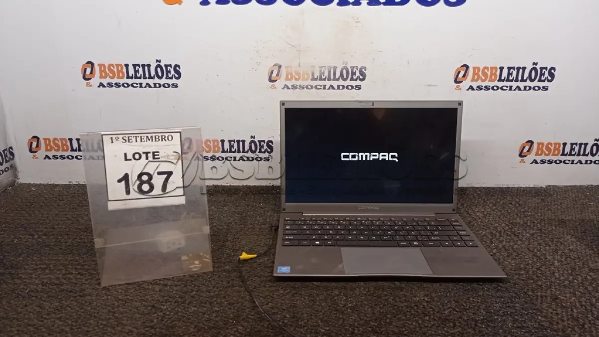 LOTE 187 - 01 NOTEBOOK COM FONTE MARCA COMPAQ. (NO ESTADO) ATENÇÃO! FAZER A VISITAÇÃO ANTES DE ARREMATAR, NÃO SABEMOS SE FUNCIONA, LEILÃO NÃO TEM GARANTIA E NEM DEVOLUÇÃO, SUJEITO A POSSÍVEIS AVARIAS VISÍVEIS/OCULTAS E/OU AUSÊNCIA DE COMPONENTES