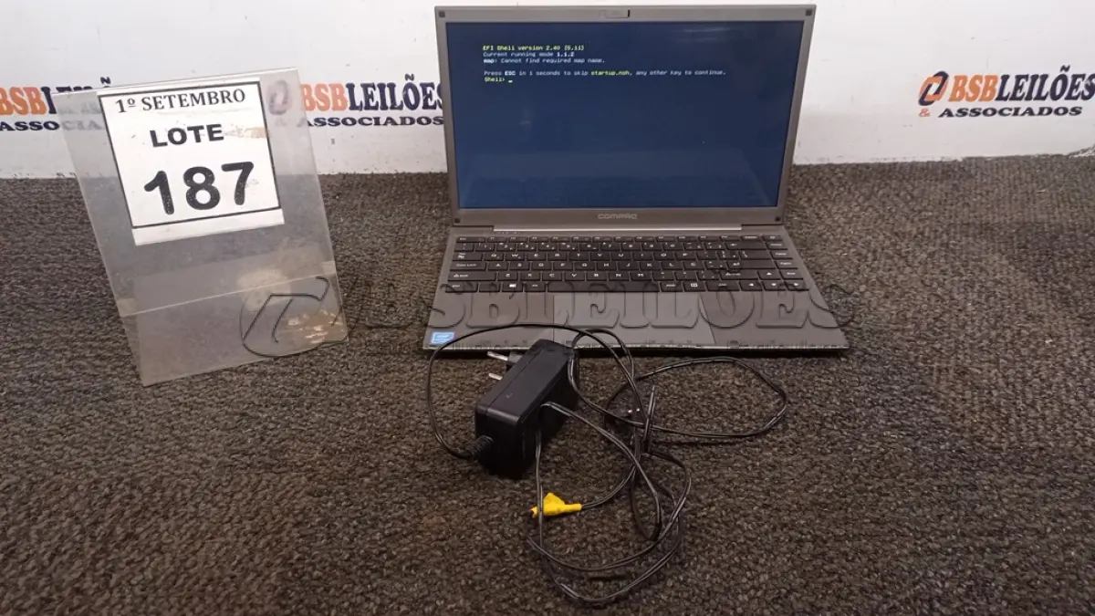 LOTE 187 - 01 NOTEBOOK COM FONTE MARCA COMPAQ. (NO ESTADO) ATENÇÃO! FAZER A VISITAÇÃO ANTES DE ARREMATAR, NÃO SABEMOS SE FUNCIONA, LEILÃO NÃO TEM GARANTIA E NEM DEVOLUÇÃO, SUJEITO A POSSÍVEIS AVARIAS VISÍVEIS/OCULTAS E/OU AUSÊNCIA DE COMPONENTES