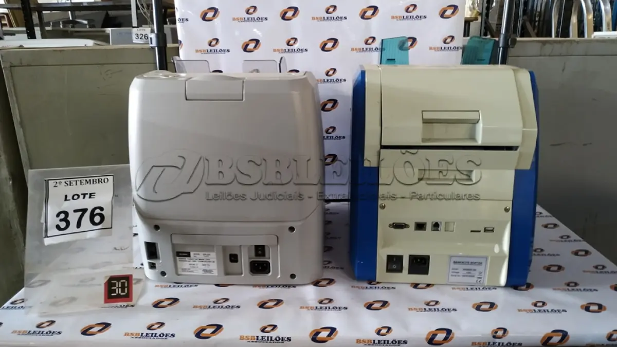 LOTE 376 - 02 MÁQUINAS DE CONTAR CÉDULAS. (NO ESTADO) ATENÇÃO! FAZER A VISITAÇÃO ANTES DE ARREMATAR, NÃO SABEMOS SE FUNCIONA, LEILÃO NÃO TEM GARANTIA E NEM DEVOLUÇÃO, SUJEITO A POSSÍVEIS AVARIAS VISÍVEIS/OCULTAS E/OU AUSÊNCIA DE COMPONENTES.