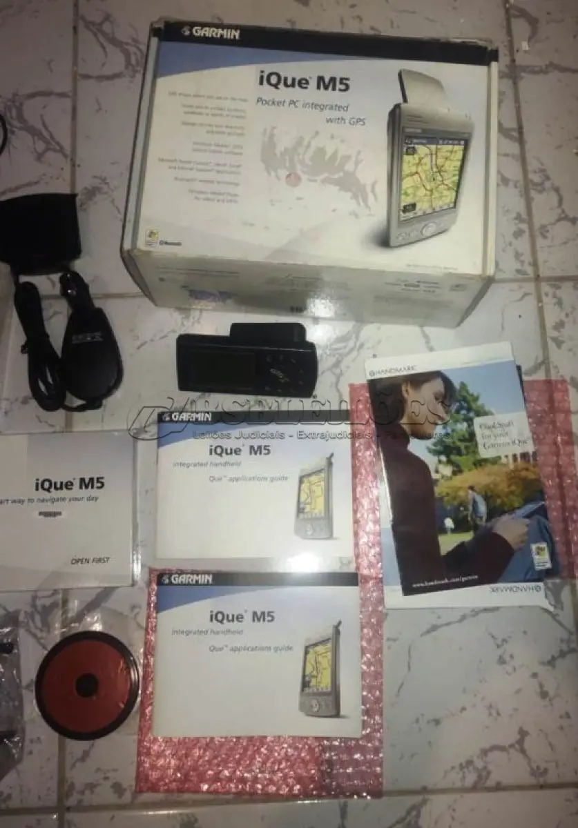 LOTE 388 - 01 GPS GARMIN IQ M5 USADO UMA ÚNICA VEZ E FOI GUARDADO. (NO ESTADO) ATENÇÃO! FAZER A VISITAÇÃO ANTES DE ARREMATAR, NÃO SABEMOS SE FUNCIONA, LEILÃO NÃO TEM GARANTIA E NEM DEVOLUÇÃO, SUJEITO A POSSÍVEIS AVARIAS VISÍVEIS/OCULTAS E/OU AUSÊNCIA DE COMPONENTES.