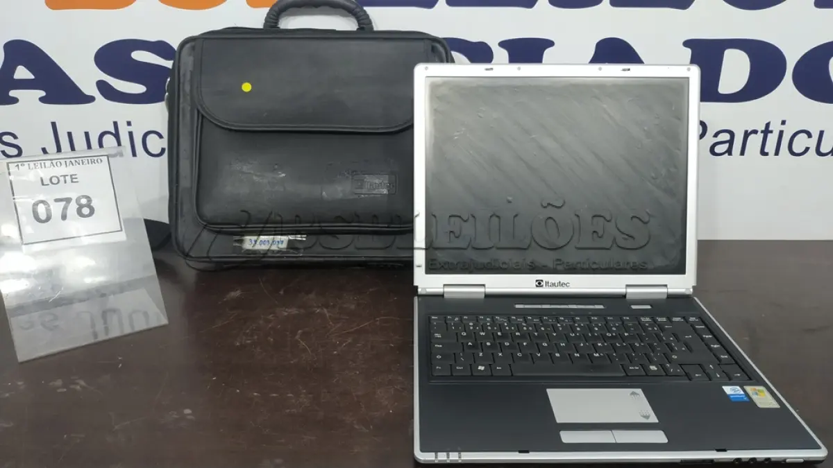 LOTE 078 - 01 NOTEBOOK COM FONTE E MALETA MARCA ITAUTEC.  (NO ESTADO) ATENÇÃO! FAZER A VISITAÇÃO ANTES DE ARREMATAR, NÃO SABEMOS SE FUNCIONA. LEILÃO NÃO TEM GARANTIA E NEM DEVOLUÇÃO, SUJEITO A POSSÍVEIS AVARIAS VISÍVEIS/OCULTAS E/OU AUSÊNCIA DE COMPONENTES.