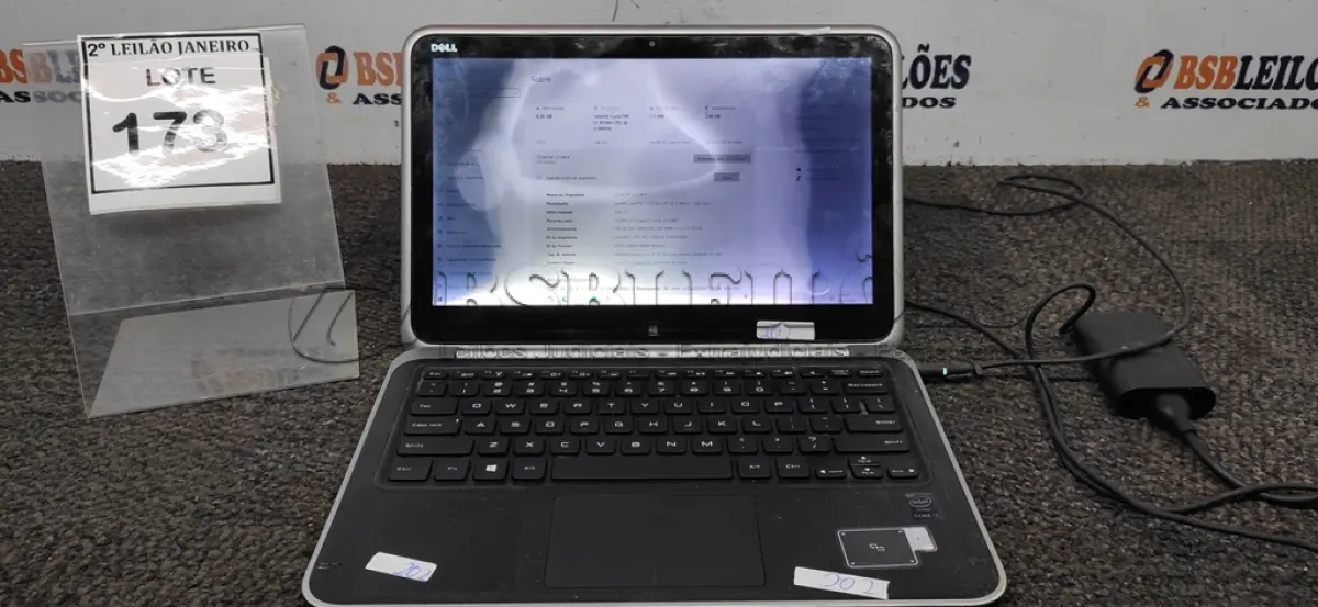 LOTE 173 - 01 TABLET COM CAPA DOBRÁVEL E TECLADO ACOPLADO COM FONTE MARCA DELL. (NO ESTADO) ATENÇÃO! FAZER A VISITAÇÃO ANTES DE ARREMATAR, NÃO SABEMOS SE FUNCIONA. LEILÃO NÃO TEM GARANTIA E NEM DEVOLUÇÃO, SUJEITO A POSSÍVEIS AVARIAS VISÍVEIS/OCULTAS E/OU AUSÊNCIA DE COMPONENTES.