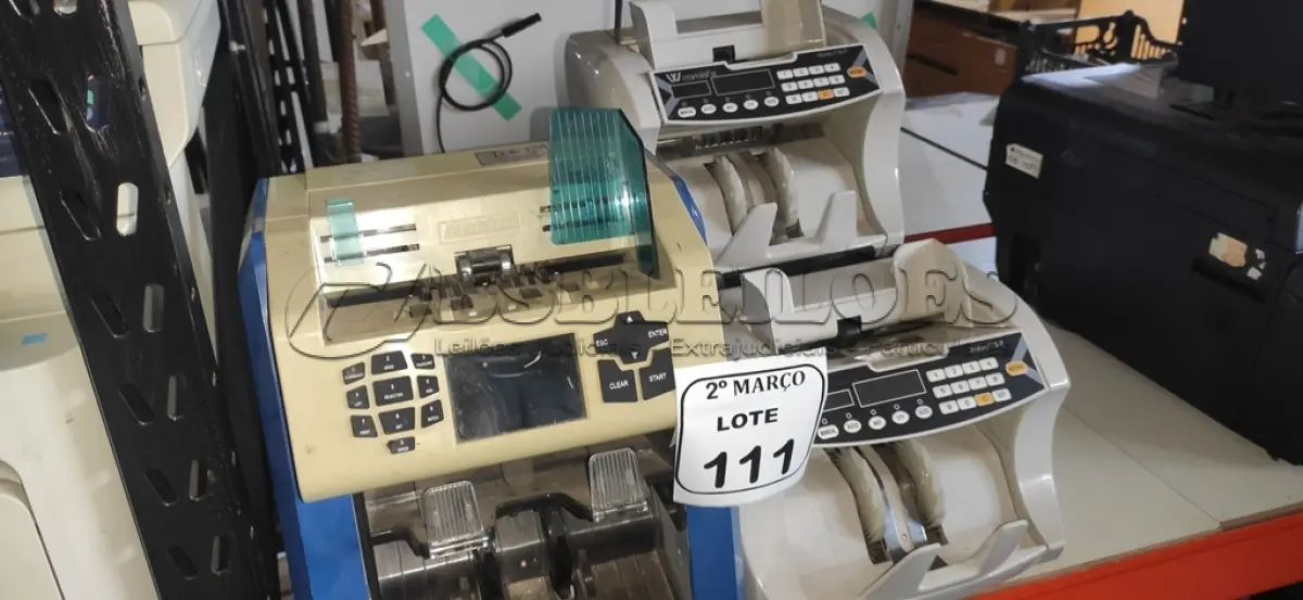 LOTE 111 - 06 MÁQUINAS DE CONTAR CÉDULAS DE MARCAS E MODELOS DIVERSOS. (NO ESTADO) ATENÇÃO! FAZER A VISITAÇÃO ANTES DE ARREMATAR, NÃO SABEMOS SE FUNCIONA, LEILÃO NÃO TEM GARANTIA E NEM DEVOLUÇÃO, SUJEITO A POSSÍVEIS AVARIAS VISÍVEIS/OCULTAS E/OU AUSÊNCIA DE COMPONENTES.