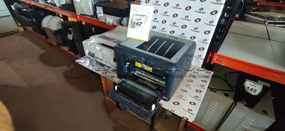 LOTE 142 - 01 IMPRESSORA MODELO LASERJET COLOR CP1515DN MARCA HP E 01 IMPRESSORA MODELO B4600 MARCA OKI. (NO ESTADO) ATENÇÃO! FAZER A VISITAÇÃO ANTES DE ARREMATAR, NÃO SABEMOS SE FUNCIONA, LEILÃO NÃO TEM GARANTIA E NEM DEVOLUÇÃO, SUJEITO A POSSÍVEIS AVARIAS VISÍVEIS/OCULTAS E/OU AUSÊNCIA DE COMPONENTES.