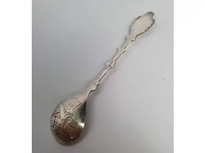 LOTE 101 - RARA COLHER IMPORTADA PRATA 90, (NO ESTADO)