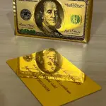 LOTE 010 - 01 BARALHO DOURADO ESPELHADO DOLLAR GOLD(NO ESTADO)