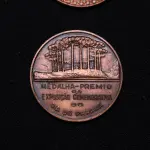 LOTE 002 - LOTE 2 – MEDALHAS DIA DO PARANA 	MEDALHA	OBSERVAÇÕES 1.		Exposição comemorativa Dia do Paraná. 1948	Prateada - envelope da Coleção Júlio Estrella Moreira 2.		Exposição comemorativa Dia do Paraná. 1948	Bronze - envelope da Coleção Júlio Estrella Moreira 3.		Exposição comemorativa Dia do Paraná. 1948	Acobreada  4.		Exposição comemorativa Dia do Paraná. 1948	Acobreada