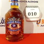 LOTE 010 - 01 GARRAFA DE WHISKY CHIVAS REGAL 18 ANOS GOLD SIGNATURE 750ML. (NO ESTADO EM QUE SE ENCONTRA) ATENÇÃO! FAZER A VISITAÇÃO ANTES DE ARREMATAR, NÃO SABEMOS SE FUNCIONA. LEILÃO NÃO TEM GARANTIA E NEM DEVOLUÇÃO, SUJEITO A POSSÍVEIS AVARIAS VISÍVEIS/OCULTAS E/OU AUSÊNCIA DE COMPONENTES.   