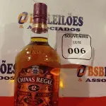 LOTE 006 - 01 GARRAFA DE WHISKY CHIVAS REGAL 12 ANOS BLENDED SCOTCH 1L. (NO ESTADO EM QUE SE ENCONTRA) ATENÇÃO! FAZER A VISITAÇÃO ANTES DE ARREMATAR, NÃO SABEMOS SE FUNCIONA. LEILÃO NÃO TEM GARANTIA E NEM DEVOLUÇÃO, SUJEITO A POSSÍVEIS AVARIAS VISÍVEIS/OCULTAS E/OU AUSÊNCIA DE COMPONENTES.  