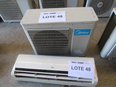 LOTE 386 - CONDICIONADOR DE AR MIDEA + MOTOR MIDEA (UNIDADE: B-041 - PRESIDENTE PRUDENTE/SP - LOCAL DE RETIRADA: RODOVIA ARTUR BOIGUES FILHO Nº 585 - PARQUE RES. CARANDA - PRESIDENTE PRUDENTE/SP – CEP: 19.026-650)