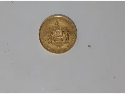 LOTE 020 - MEDALHA DE OURO COMEMORAÇÃO DE  1 MILHÃO DE FUSCAS FABRICADOS NO BRASIL - 1970 - SÃO BERNARDO DO CAMPO - DIÂMETRO 22 MM - PESANDO 7 GRAMAS - MATERIAL - OURO (900) - GRAVADOR - A.M (NO ESTADO)