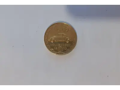 LOTE 020 - MEDALHA DE OURO COMEMORAÇÃO DE  1 MILHÃO DE FUSCAS FABRICADOS NO BRASIL - 1970 - SÃO BERNARDO DO CAMPO - DIÂMETRO 22 MM - PESANDO 7 GRAMAS - MATERIAL - OURO (900) - GRAVADOR - A.M (NO ESTADO)