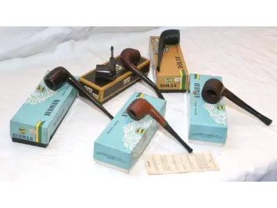 LOTE 277 - LOTE COM 6 RAROS CACHIMBOS SÉCULO XX. (JCI, CARTER) -  EM MADEIRA COM A PITEIRA EM BAQUELITE, À SABER: 4 (QUATRO) CACHIMBOS JCI (J. CARNEIRO & IRMÃOS),  EM EXCELENTE ESTADO DE CONSERVAÇÃO. (NO ESTADO)